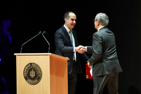 Ambassador Gaddi Vasquez introduces Chapman President Matt Parlow at the Orange State of the City event