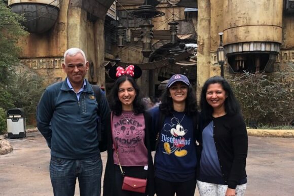 Arshia Sharma stands with three family members in front of the Star Wars: Galaxy’s Edge entrance at Disneyland.