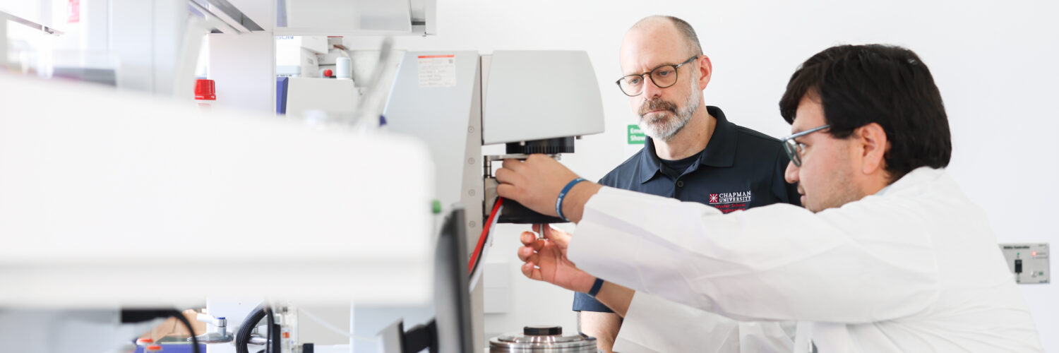 Andrew Lyon and Daniel Cárdenas-Vásquez setting up the rheometer to measure the mechanical properties of the biomaterial.