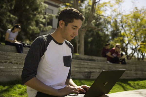A current Chapman student studying while on campus