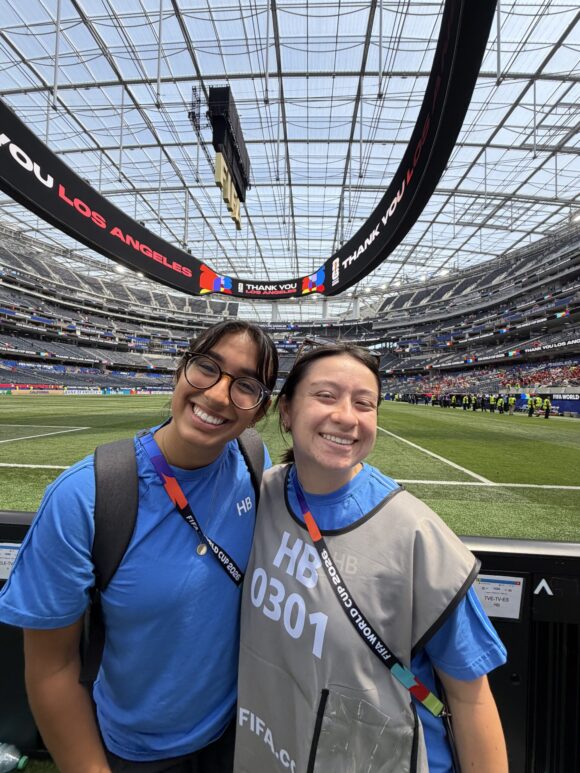 Bella Ortiz and Caroline Chang pose at SoFi Stadium.