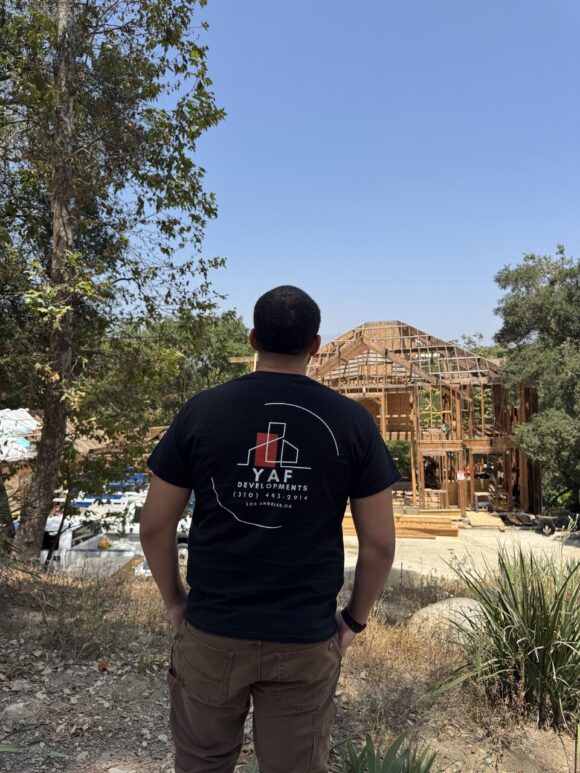 Yousef Al-Fassi, founder and CEO of YAF Development, oversees construction of a client's luxury home.