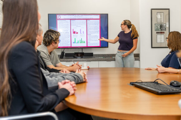Suzanne Cibrowski ’29 presents research on social media news sources and distrust of government to Chapman University’s Team Fear.